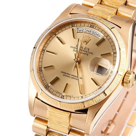 pre owned men's gold rolex.